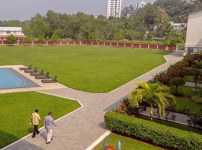 Modern RECCAA Club walkways, pool, and campus grounds